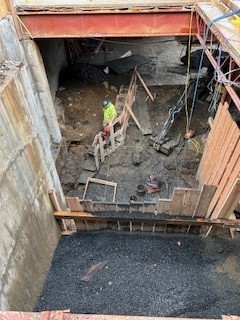 Hand digging elevator pit